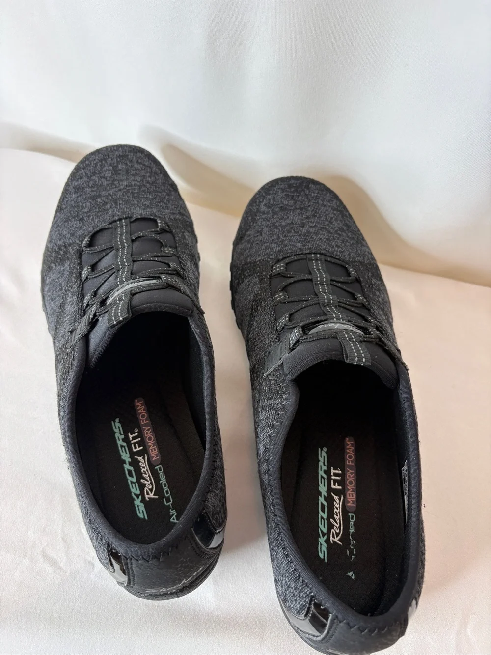 Skechers Women's Black Knit Slip-On Sneakers